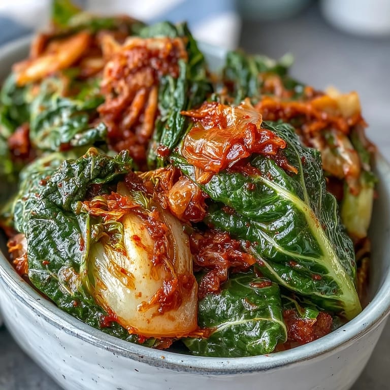 Freshly made kimchi glistening with chili flakes, a probiotic-rich delight.