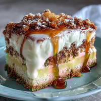 Bright, zesty lemon tart with a crisp, buttery crust, dusted with powdered sugar for an elegant dessert centerpiece.